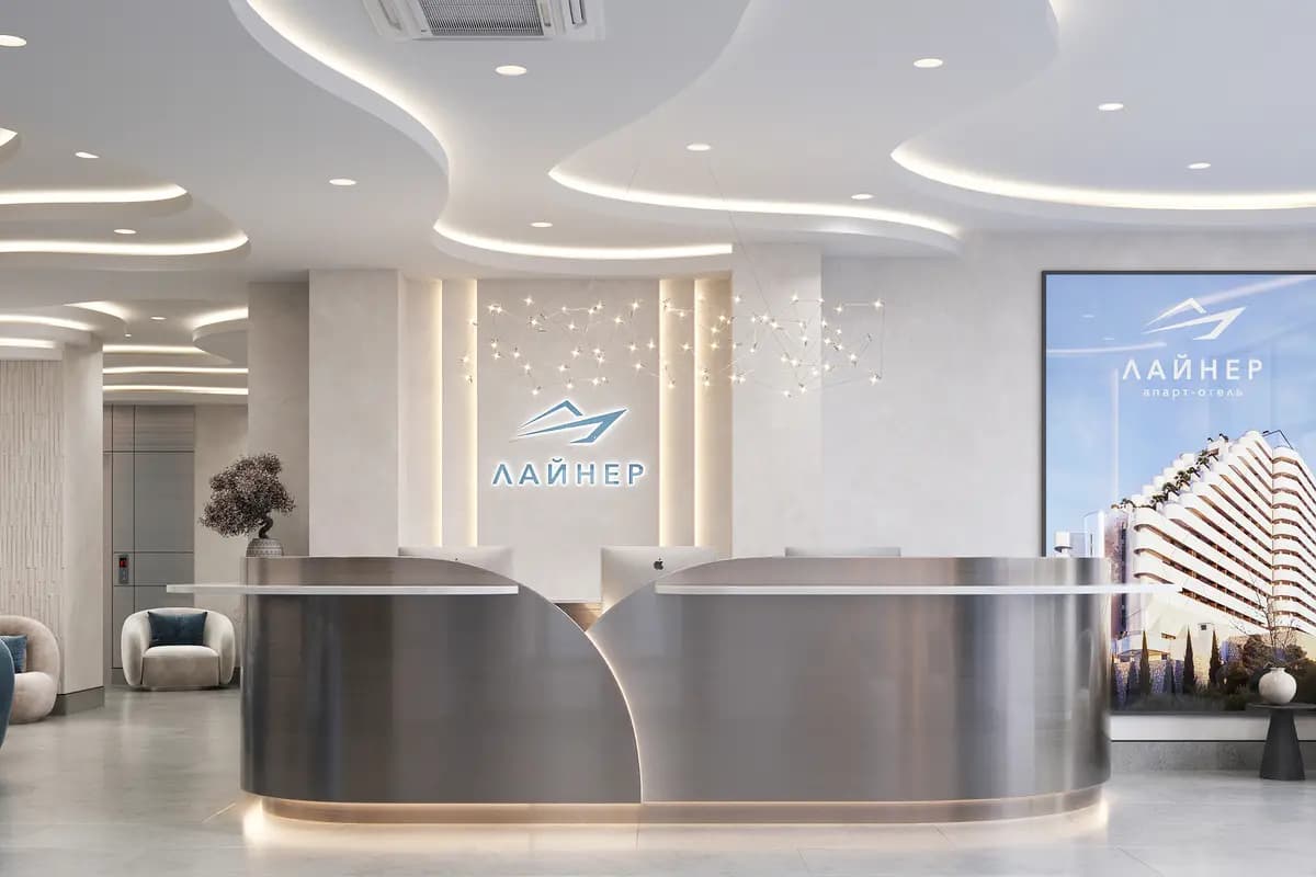 Лобби ЖК Лайнер — ресепшен с логотипом